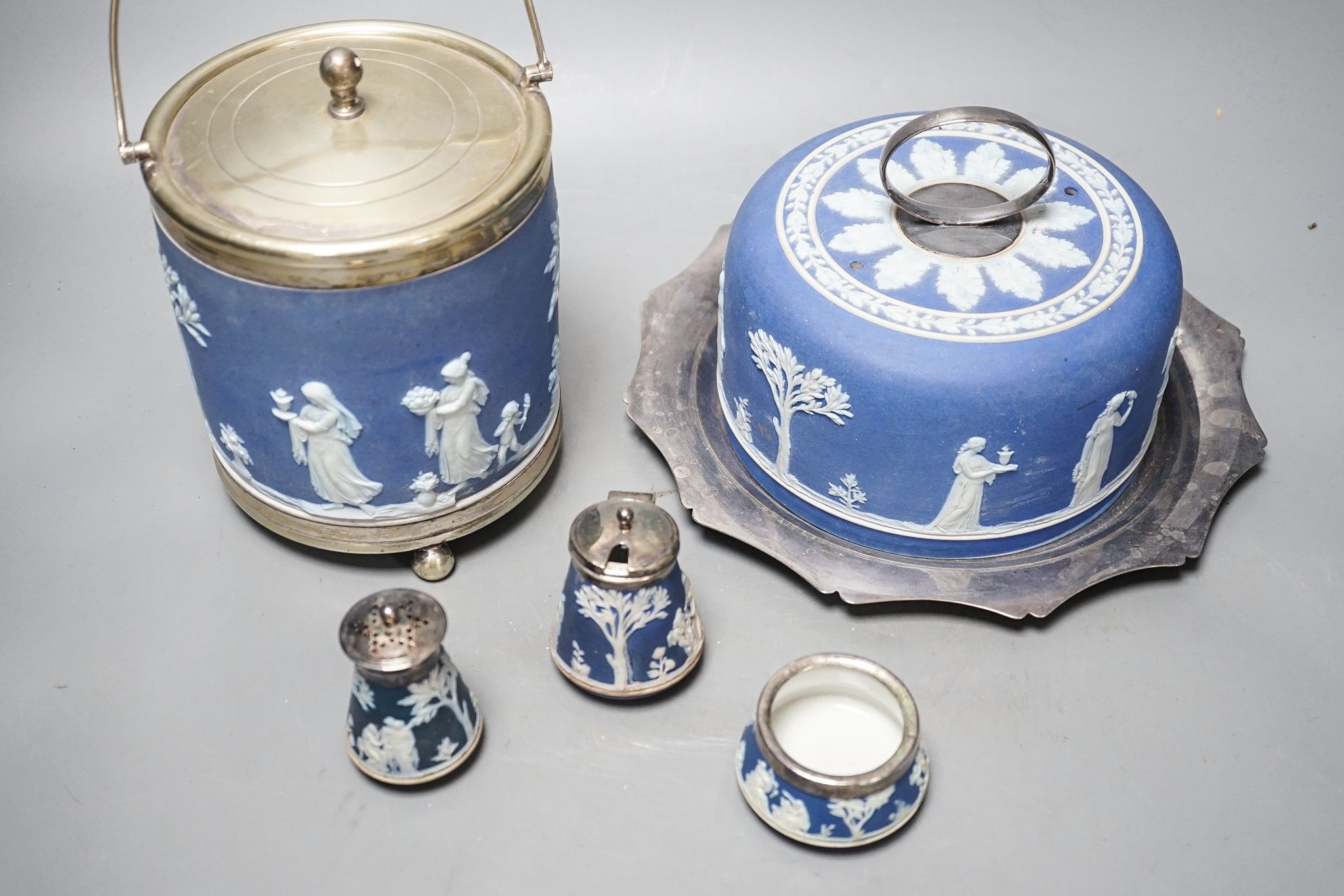 A Victorian Wedgwood blue jasper biscuit barrel and a blue jasper cheese dish cover, with a plated stand , 3 piece condiment set